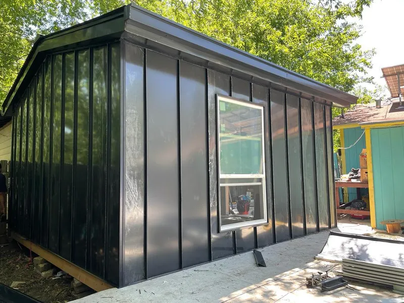 Black standing seam metal wall panels for Metal Roof Installation in Reedsburg