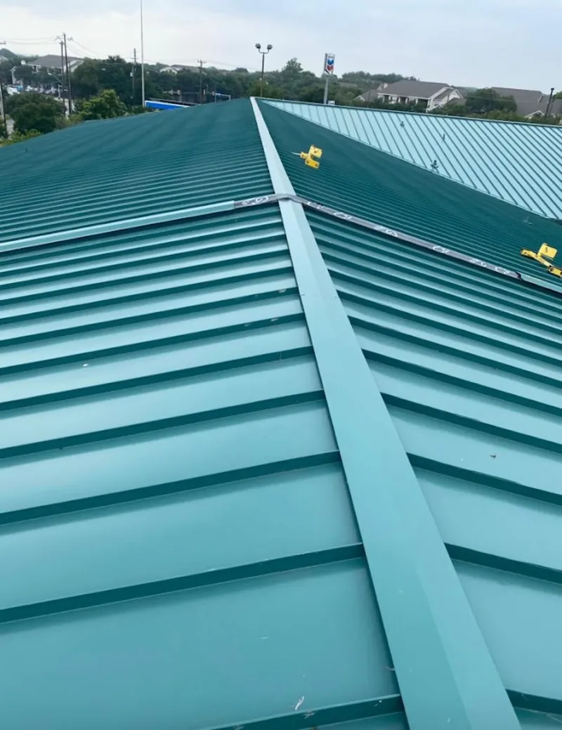 Green commercial metal roof ridge and valley for Metal Roof Repair in Reedsburg